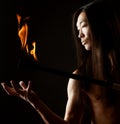 Asian man with fire show Royalty Free Stock Photo