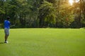 Asian man golfer playing golf at golf course Royalty Free Stock Photo