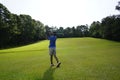 Asian man golfer playing golf at golf course Royalty Free Stock Photo