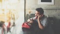 Asian man happy talk phone call in coffee shop Royalty Free Stock Photo