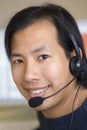Asian man with headset Royalty Free Stock Photo