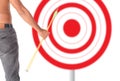 Asian man holding bow and shooting to archery target. Royalty Free Stock Photo