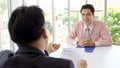 Asian man in job interview at office background, job search, business concept Royalty Free Stock Photo