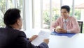 Asian man in job interview at office background, job search, business concept Royalty Free Stock Photo