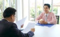 Asian man in job interview at office background, job search, business concept Royalty Free Stock Photo