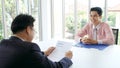 Asian man in job interview at office background, job search, business concept Royalty Free Stock Photo