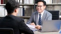 Asian man in job interview at office background, job search, business concept Royalty Free Stock Photo