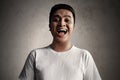 Asian man laugh something funny Royalty Free Stock Photo