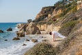 Asian man meditates in yoga position on high Royalty Free Stock Photo