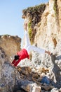 Asian man meditates in yoga position on high Royalty Free Stock Photo