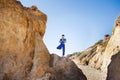 Asian man meditates in yoga position on high Royalty Free Stock Photo