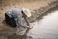 Asian man on nature ,crisis of water drought concept