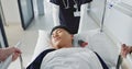 Asian man, patient and push bed in hospital for surgery, emergency or medical problem in corridor. Medicine Royalty Free Stock Photo