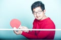 Asian man playing table tennis Royalty Free Stock Photo