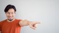 Asian man pointing Royalty Free Stock Photo