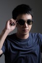 Asian man portrait with retro sunglasses Royalty Free Stock Photo