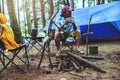 Asian man relax travel nature in the holiday. camping and Boil water drink coffee on the doi inthanon. at Chiangmai in Thailand Royalty Free Stock Photo