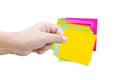 Asian Man's Hand Hold The Colorful Sticky Notes. Royalty Free Stock Photo