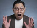 Asian Man Shocked with Mouth Open Royalty Free Stock Photo