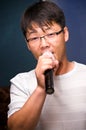 Asian man singing Royalty Free Stock Photo