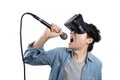 Asian man singing with VR Royalty Free Stock Photo