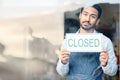 Asian man, small business and closed sign for out of service in coffee shop or restaurant closing. Portrait of male