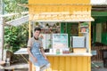 Asian man small business owner at his shop made of truck container Royalty Free Stock Photo