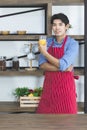 Asian man standing and drinking orange juice Royalty Free Stock Photo