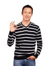 Asian Man In Striped Pullover Royalty Free Stock Photo