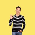 Asian Man In Striped Pullover Royalty Free Stock Photo