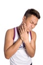Asian man suffering from painful toothache,