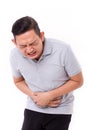 Asian man suffering from stomachache, constipation
