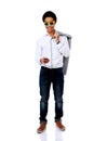 Asian man in sunglasses using smarthone Royalty Free Stock Photo