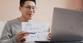 Asian man teacher working from home teach online.