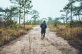 Asian men travel photograph nature. Travel relax. Walk on the path. Nature Study in the Jungle. Thailand Royalty Free Stock Photo