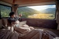 Asian man traveler taking photo in camper van