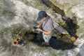 Asian man visiting and taking photo of the Wild Willy`s Hot Spring