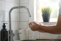Asian Man Washing Hand with Soap to Prevent Coronavirus Covid-19