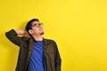 Asian man wearing glasses smiling look at copy Royalty Free Stock Photo