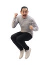 Asian man wearing grey shirt black denim and white shoes, jump while screaming shouting celebrating victory, winning gesture Royalty Free Stock Photo