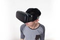 Asian man wearing VR goggle and immersing himself in VR multimedia Royalty Free Stock Photo