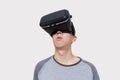 Asian man wearing VR goggle and immersing himself in VR multimedia Royalty Free Stock Photo
