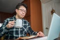 An Asian man who is self-isolated and working from home because of a massive pandemic
