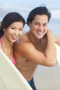 Asian Man Woman Couple Surfboards on Beach Royalty Free Stock Photo