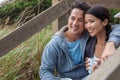 Asian Man Woman Romantic Couple on Beach Steps Drinking Coffee or Tea Royalty Free Stock Photo