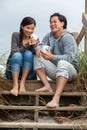 Asian Man Woman Romantic Couple on Beach Steps Royalty Free Stock Photo