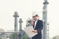 Asian man work experience and professional occupational engineer electrician with safety control at power plant energy industry an