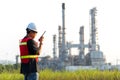 Asian man worker and engineer electrician work safety control at power plant energy industry, people work Thailand.