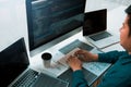 Asian man working code program developer computer web development working design software on desk in office Royalty Free Stock Photo