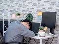 Asian man working with laptop computer in his room, condominium Royalty Free Stock Photo